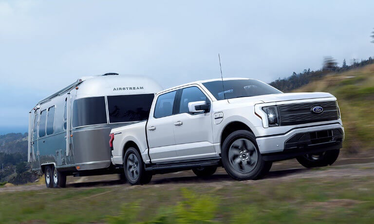 2023 Ford F-150 Lightning towing a trailer